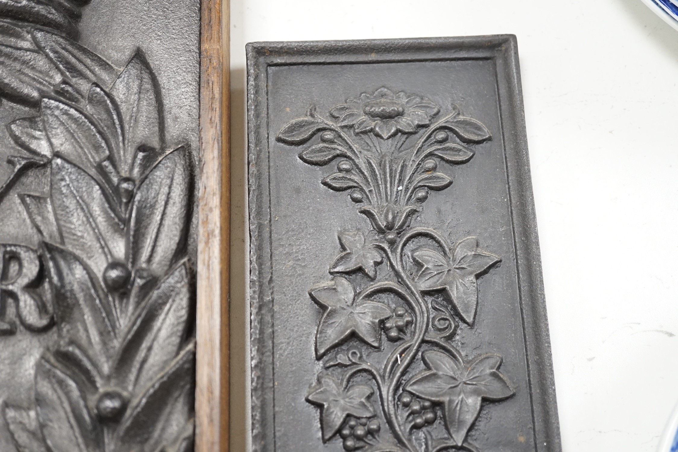 A pair of William IV Board of Ordinance cast iron framed plaques and a smaller plaque, each 54cms high x 17cms wide